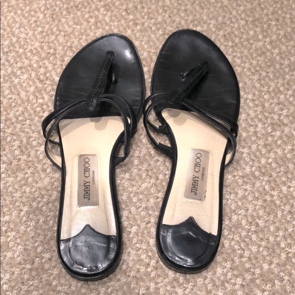 Jimmy Choo flat leather sandals.